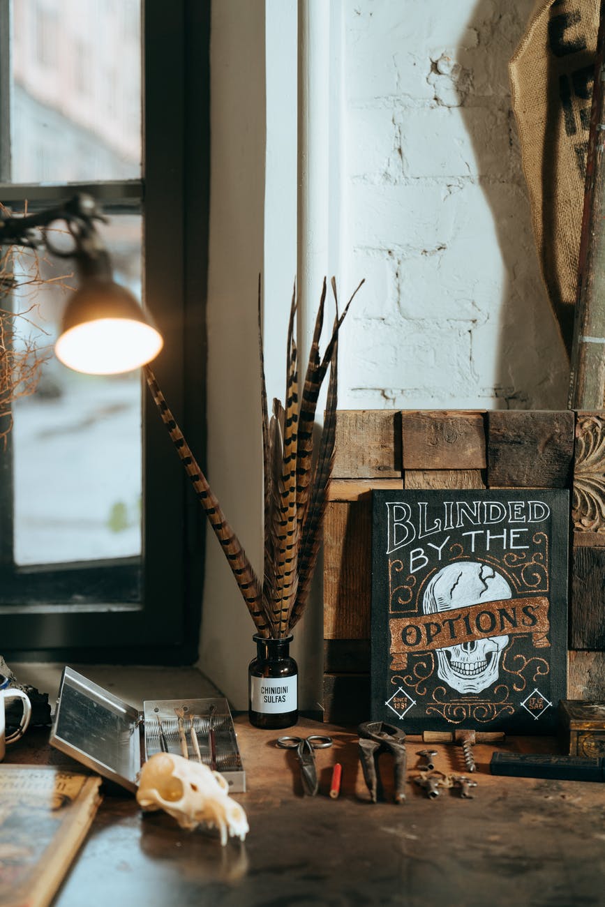 black and white table lamp on brown wooden table